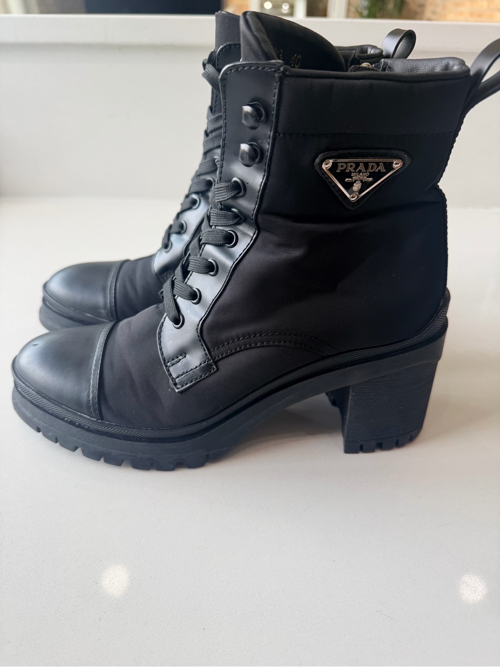Prada Black Lug Sole Combat Heel Boots w/ Logo Plaque